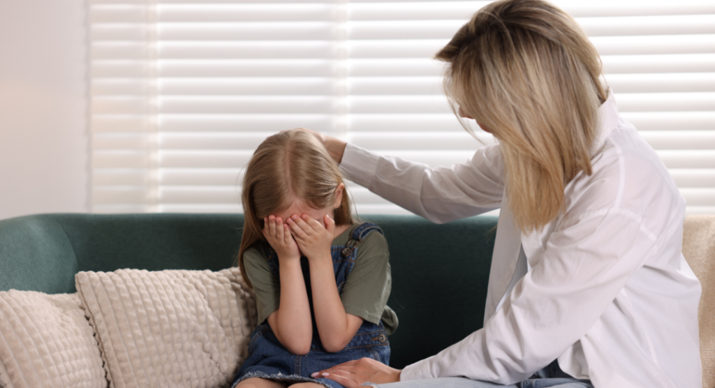 Parent and child sitting together — recognizing 8 signs your child may need therapy support